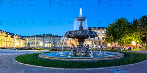 Schlossplatz with fountain and New Palace travelling panorama blue hour in Stuttgart