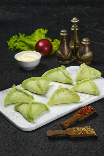 Frozen dumplings with spinach