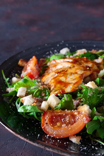 Fried turkey fillet with arugula