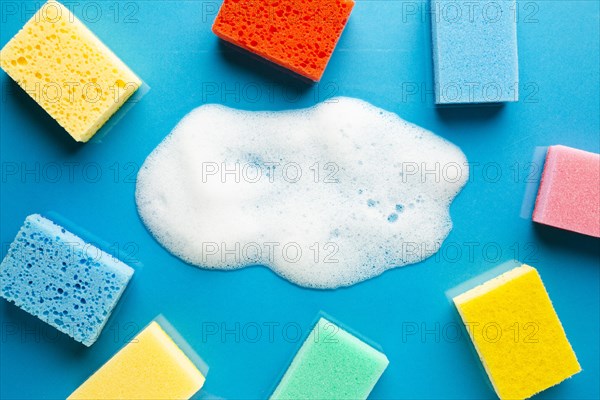 Colorful sponges foam flat lay