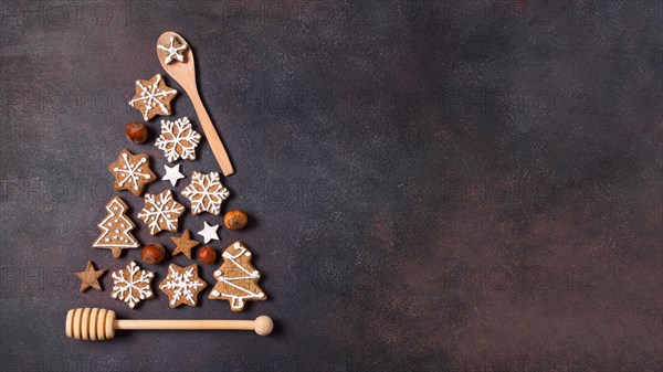 Top view christmas tree shape made gingerbread cookies kitchen utensils with copy space. Resolution and high quality beautiful photo