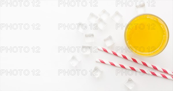 Top view orange juice glass with straws copy space 1. Resolution and high quality beautiful photo
