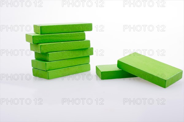 Colorful Domino Blocks in a line on a white background