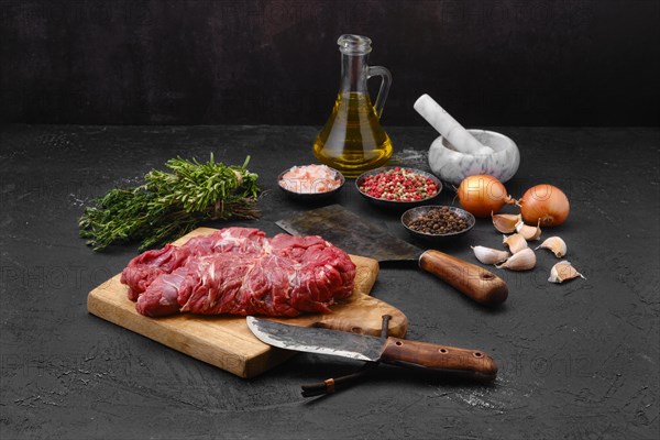 Raw fresh lamb boneless neck meat on cutting board