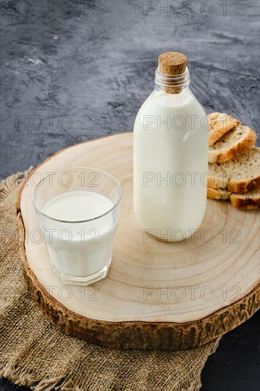 Bottle and a glass of fresh milk