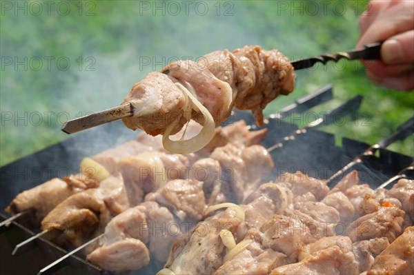 Process of cooking shashlik from pickled meat outdoor