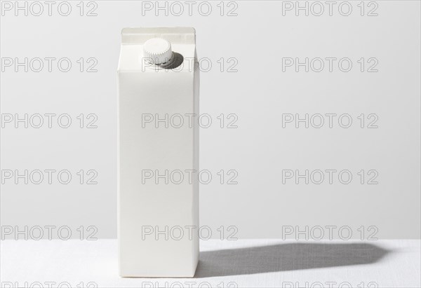 Front view milk carton with copy space