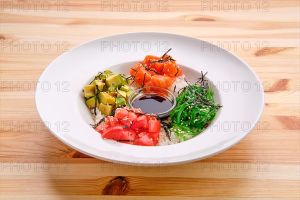 Salmon sashimi rice bowl with avocado