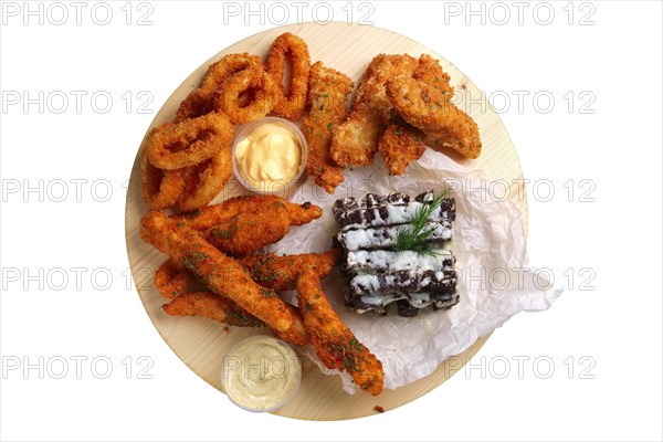 Big set of snack for beer with onion rings and carrot in breading