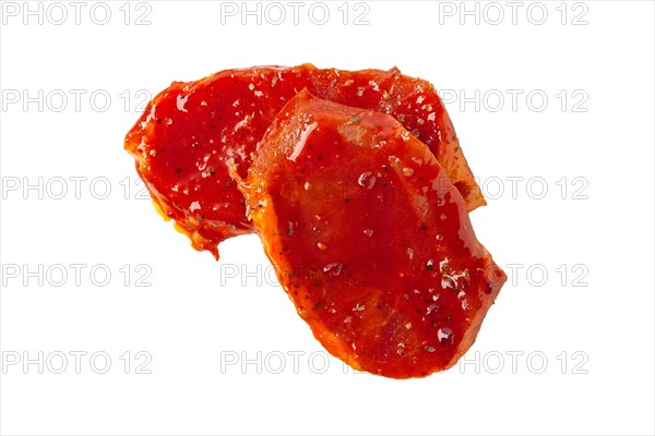 Raw piece of meat with spice and sauce prepered for barbecue. Gastronomy template isolated on white background