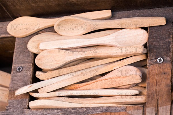 Dozens of soup spoon or tablespoon made of wood