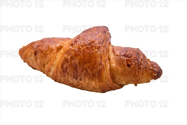 Fresh and tasty croissant over white background