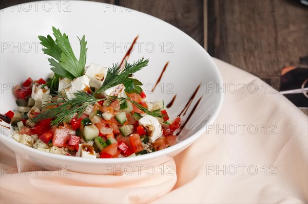 Vegetable salad with fried chicken meat. Greek salad