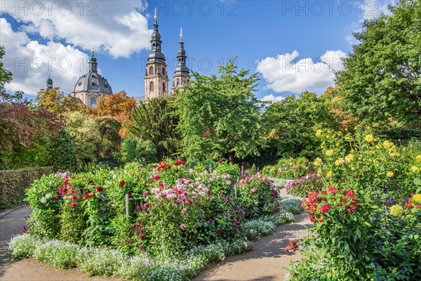 Dahlia garden with towers of St. Salvator Cathedral