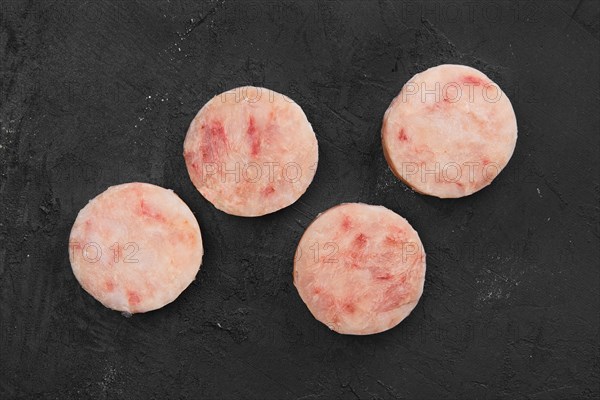 Frozen round fish cutlet for burger or frying