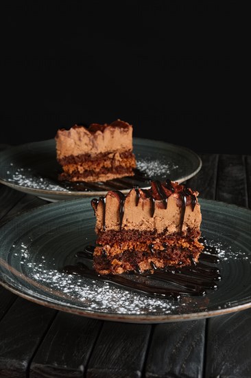 Two pieces of puffy chocolate cake with souffle