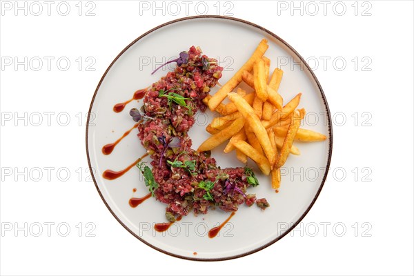 Beef tartare with fried potato isolated on white background