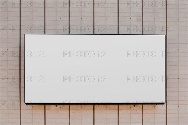 Rectangular white blank billboard striped wall