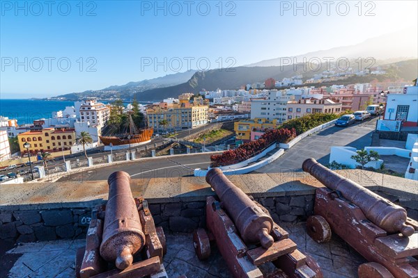 View over the cannons of the fortress Castillo de la Virgen to the capital Santa Cruz