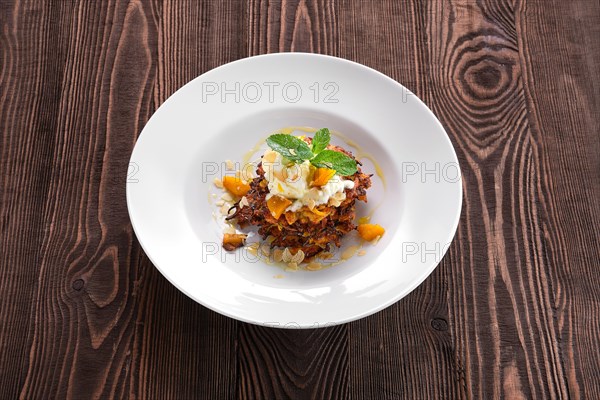 Pumpkin fritters with soft cheese