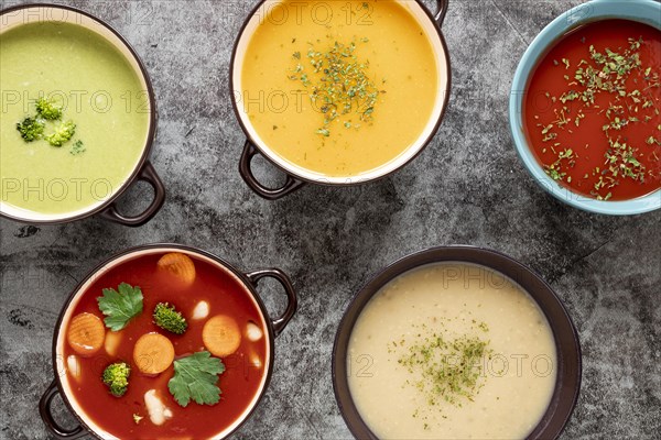 Flat lay homemade soups assortment