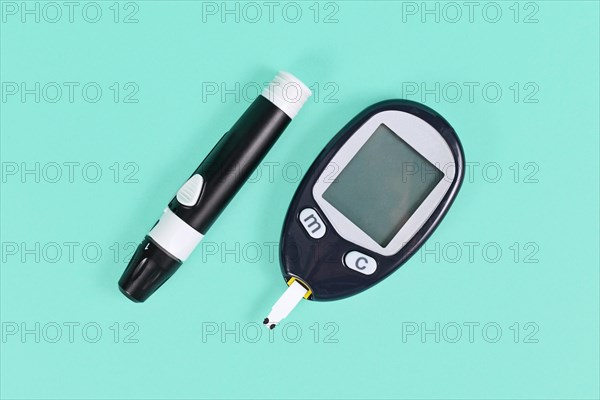 Diabetes treatment tools with blood glucose sugar meter and lancing device with lancet