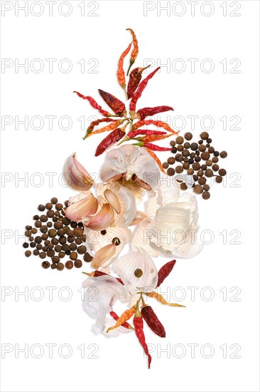 Composition with garlic and chilli pepper isolated on white background