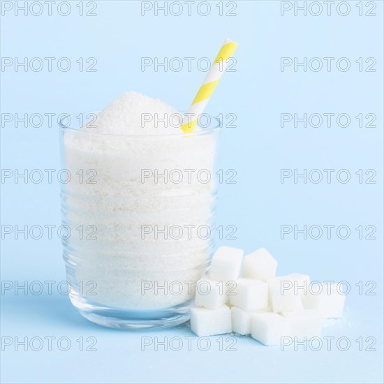 Front view glass with sugar straw