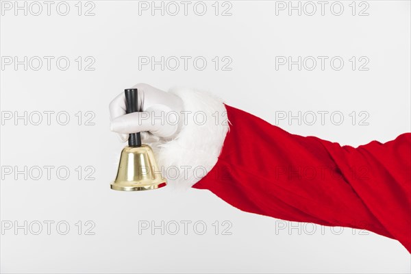 Santa claus holding bell