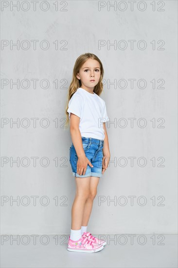 Little child girl in white t-shirt