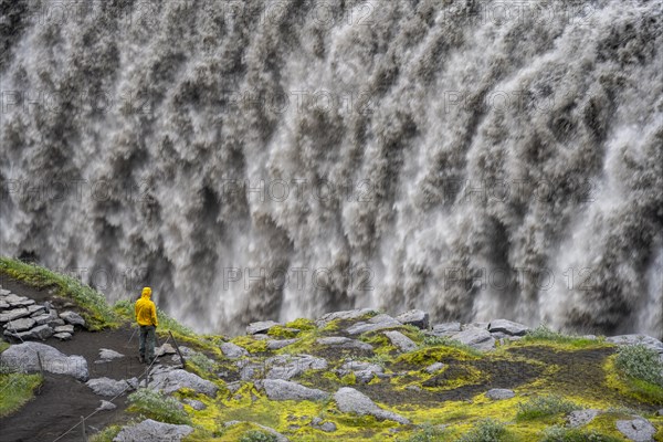 Tourist standing at a canyon