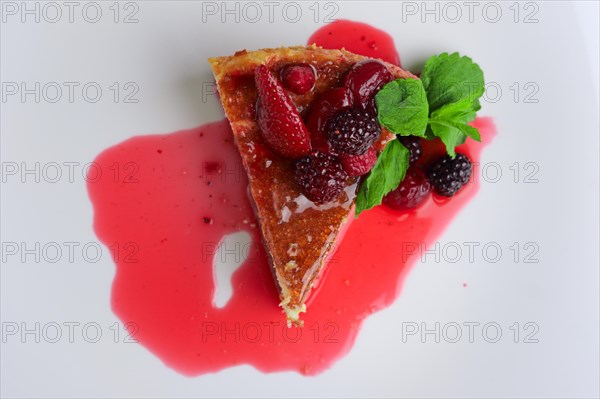 Top view of cheesecake with cherry