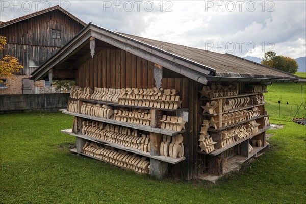 Wooden blanks for souvenirs to dry at a wooden hut