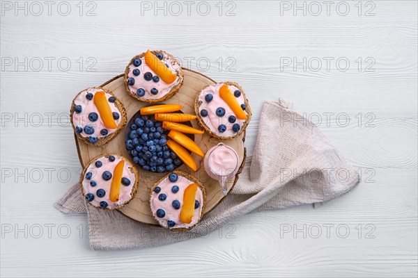 Overhead view of sweet buns with yogurt