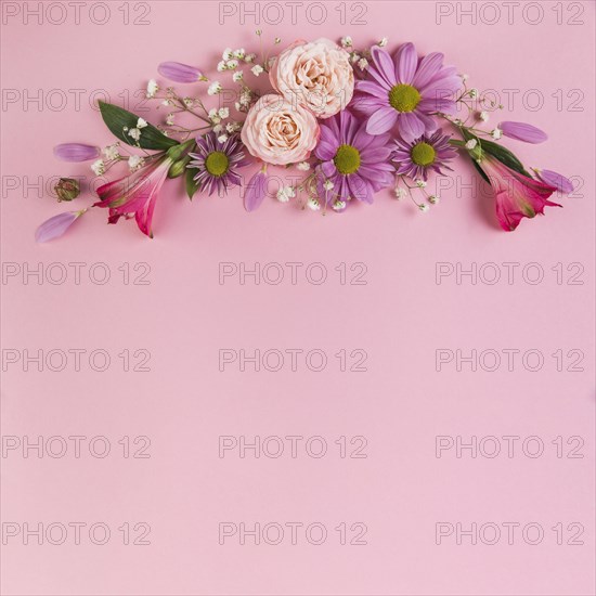 Flower decoration against pink background