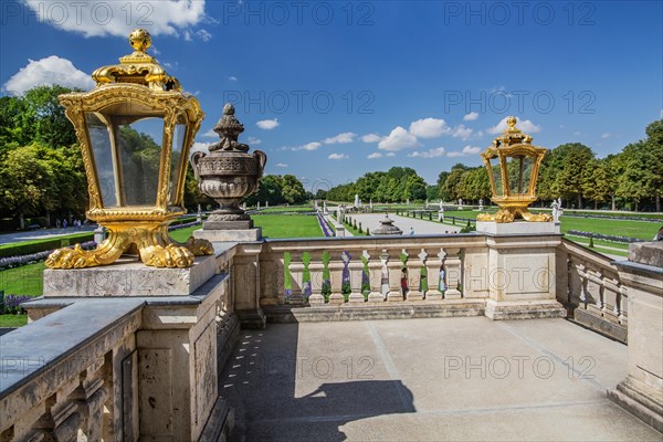 Staircase at the palace with view to the baroque garden parterre in the palace park