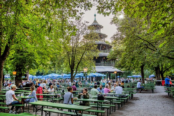 Beer garden at the Chinese Tower in the English Garden in the evening sun