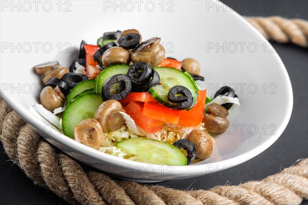 Closeup plate with salad with mushroom