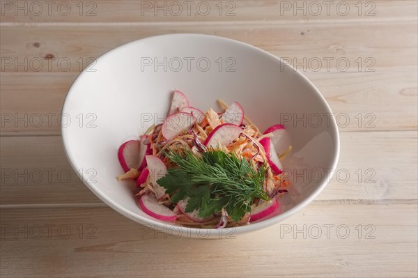 Portion of salad with radish