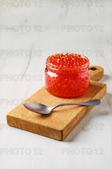 Open bowl with pink salmon red caviar