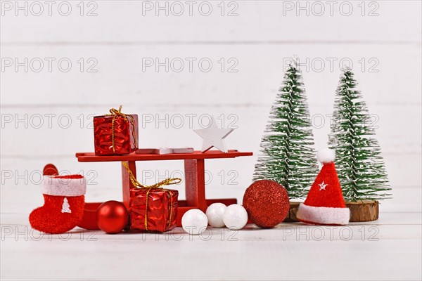 Christmas arrangement with red slide