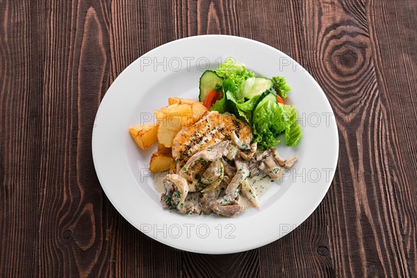 Grilled chicken fillet with oyster mushrooms