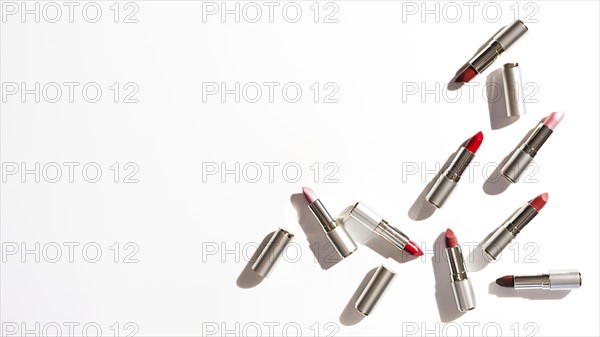 Group metallic lipsticks white background