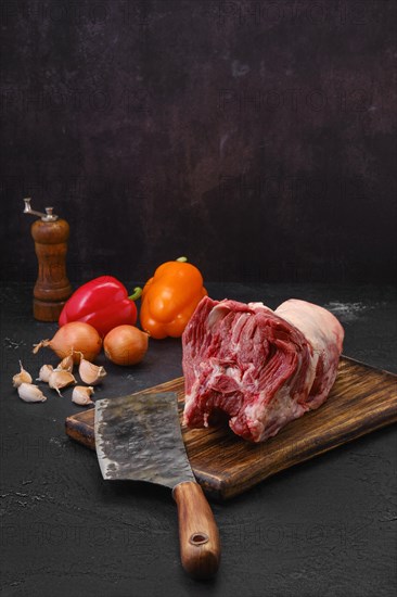 Raw fresh lamb neck meat on cutting board