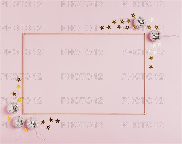 Cute frame with christmas balls pink background