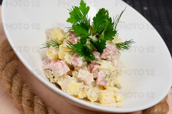 Traditional russian olivie salad