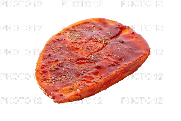 Raw piece of meat with spice and sauce prepered for barbecue. Gastronomy template isolated on white background