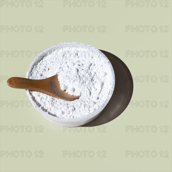 Close up powder bowl plain background