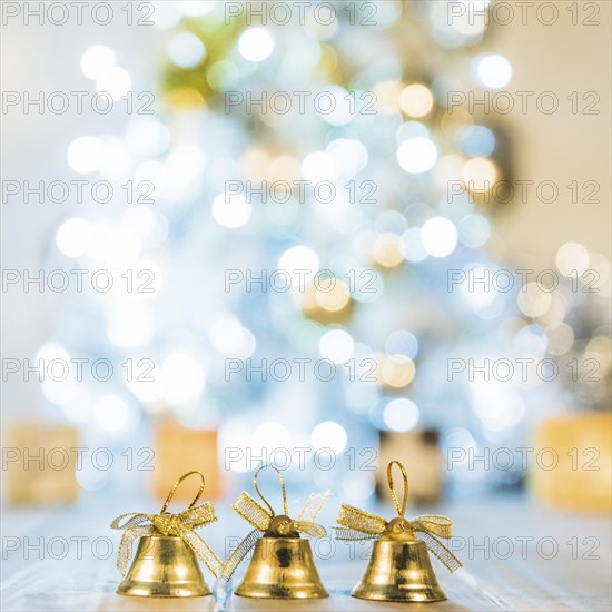 Decorative bells near christmas tree