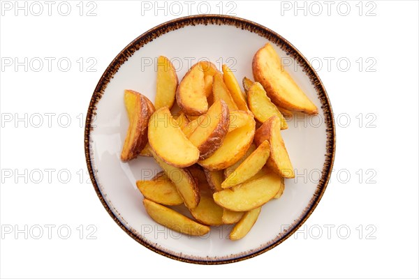 Plate with fried potato wedges isolated on white background